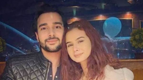 منة عرفة وزوجها _