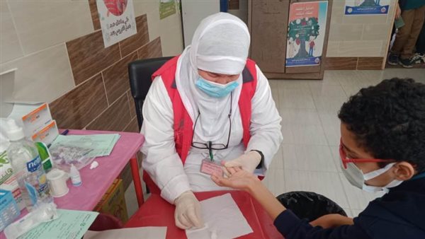 فحص 98 الف طالب وطالبة