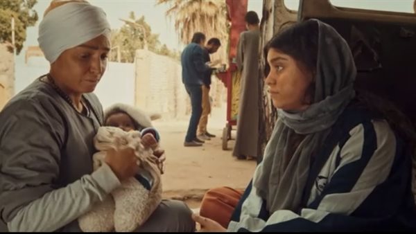 روجينا وابنها في