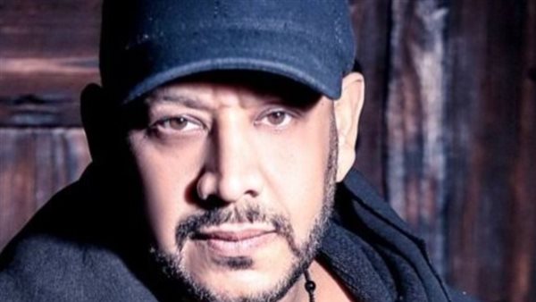 عصام كاريكا