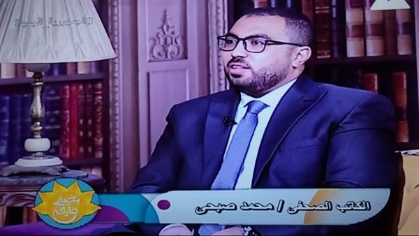  الكاتب الصحفي محمد