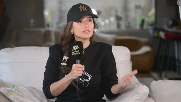 زينة مع الاعلامية