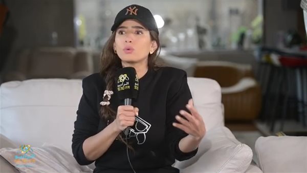 زينة مع الاعلامية