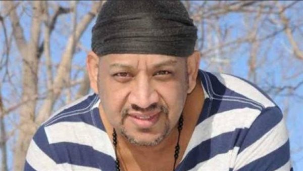 عصام كاريكا