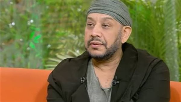 عصام كاريكا