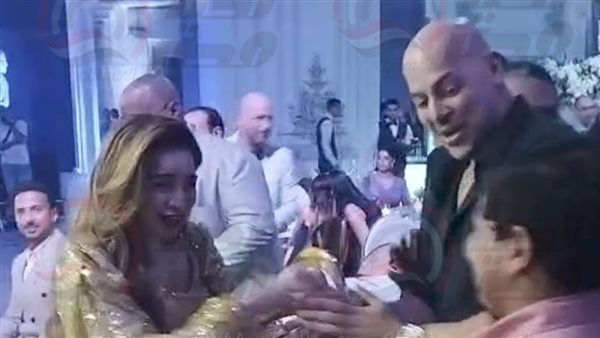 مي عز الدين وأحمد