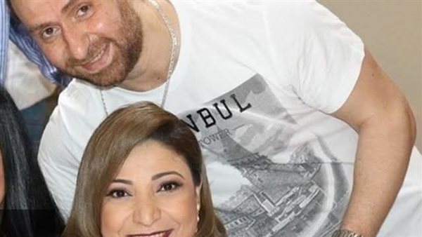 نضال الشافعي وزوجته