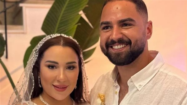 أسما شريف منير وزوجها