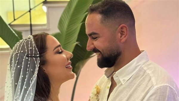 أسما شريف منير وزوجها