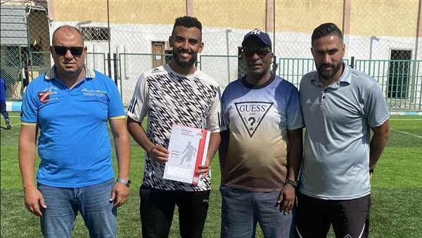 كوليبالي مع مسؤلي