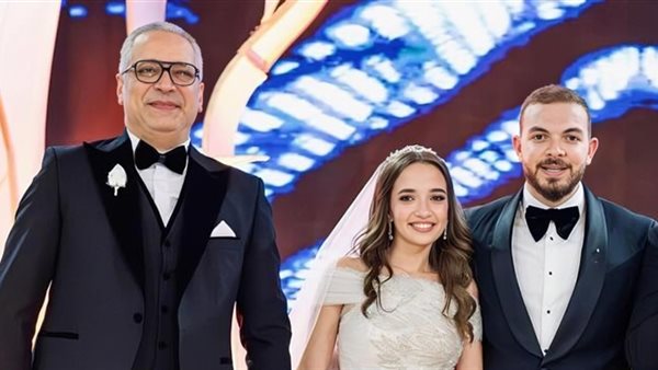 شريف الليثي وزوجته