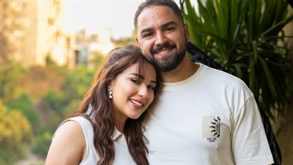 اسما شريف منير زوجها