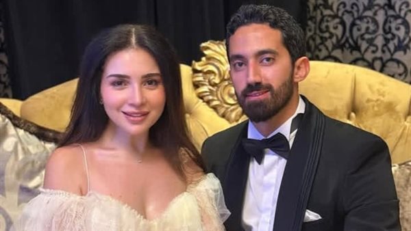 مي عز الدين وزوجها