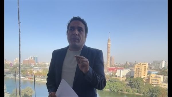 الكاتب الصحفي محمود