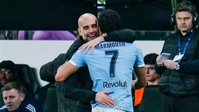 بيب جوارديولا وعمر مرموش    